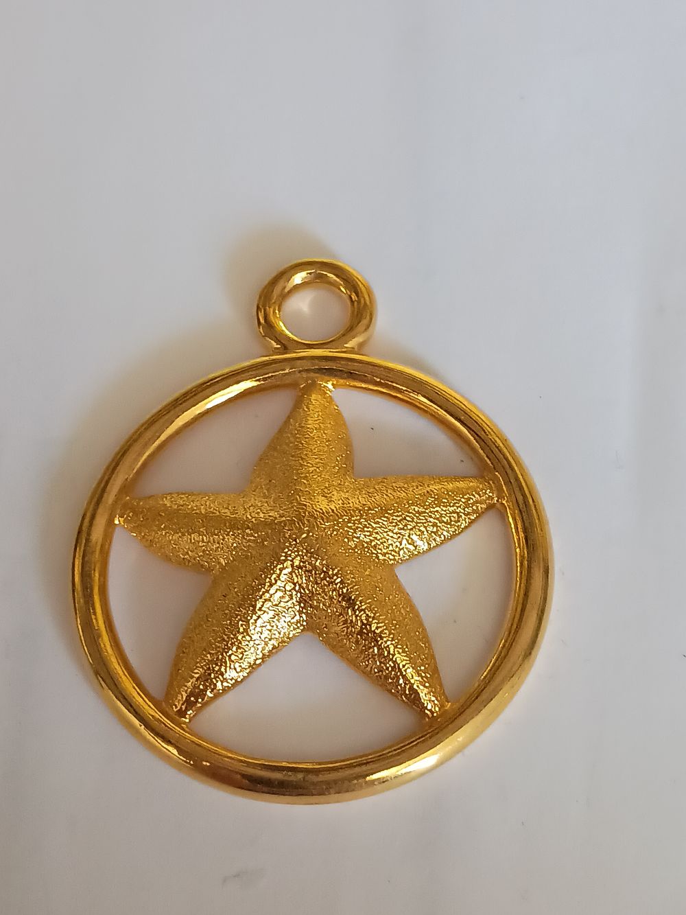 Lot 181: Large starfish pendant