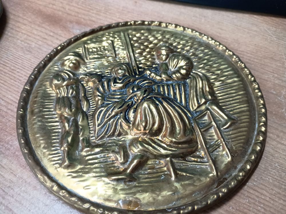 Lot 99: Brass hanging collectable