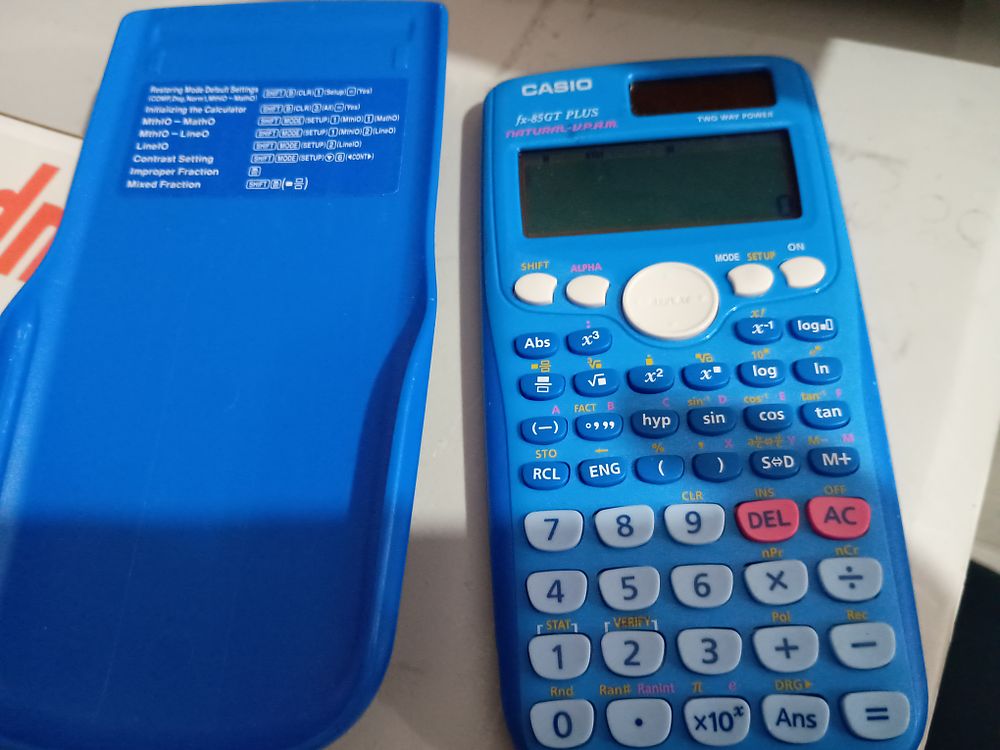 Lot 147: Casio blue calculator