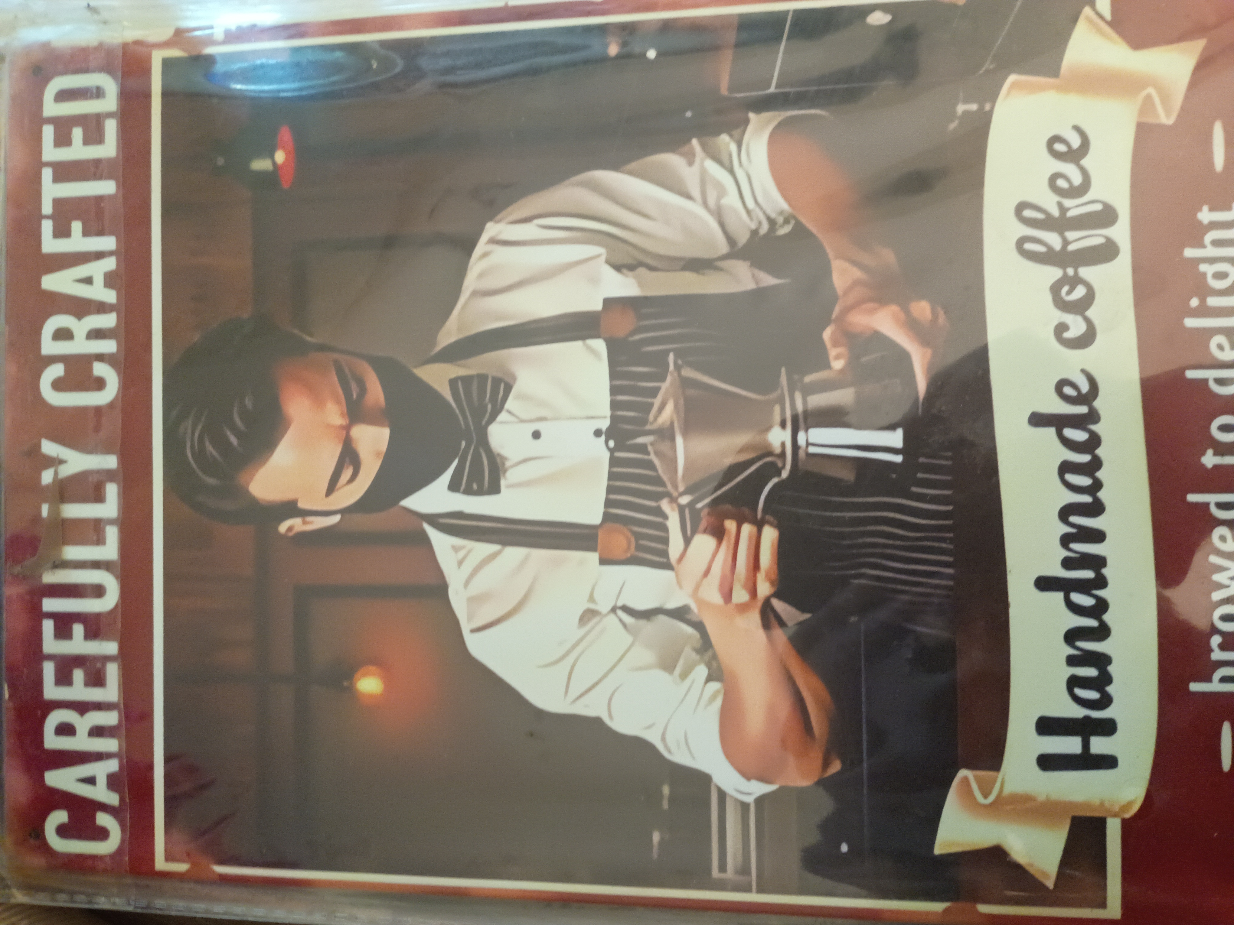 Tin sign