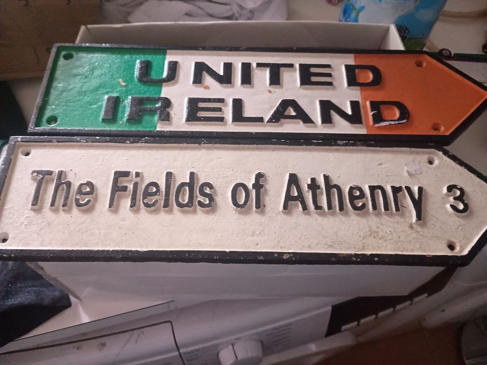 Lot 147: Fields of athenry cast iron sign