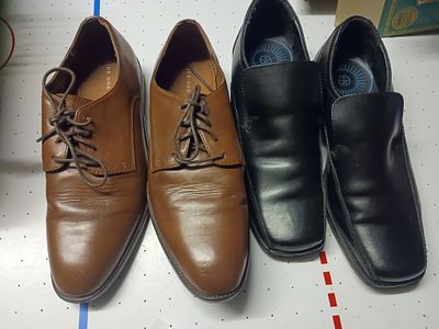 2 pairs of mens shoes. Good condition