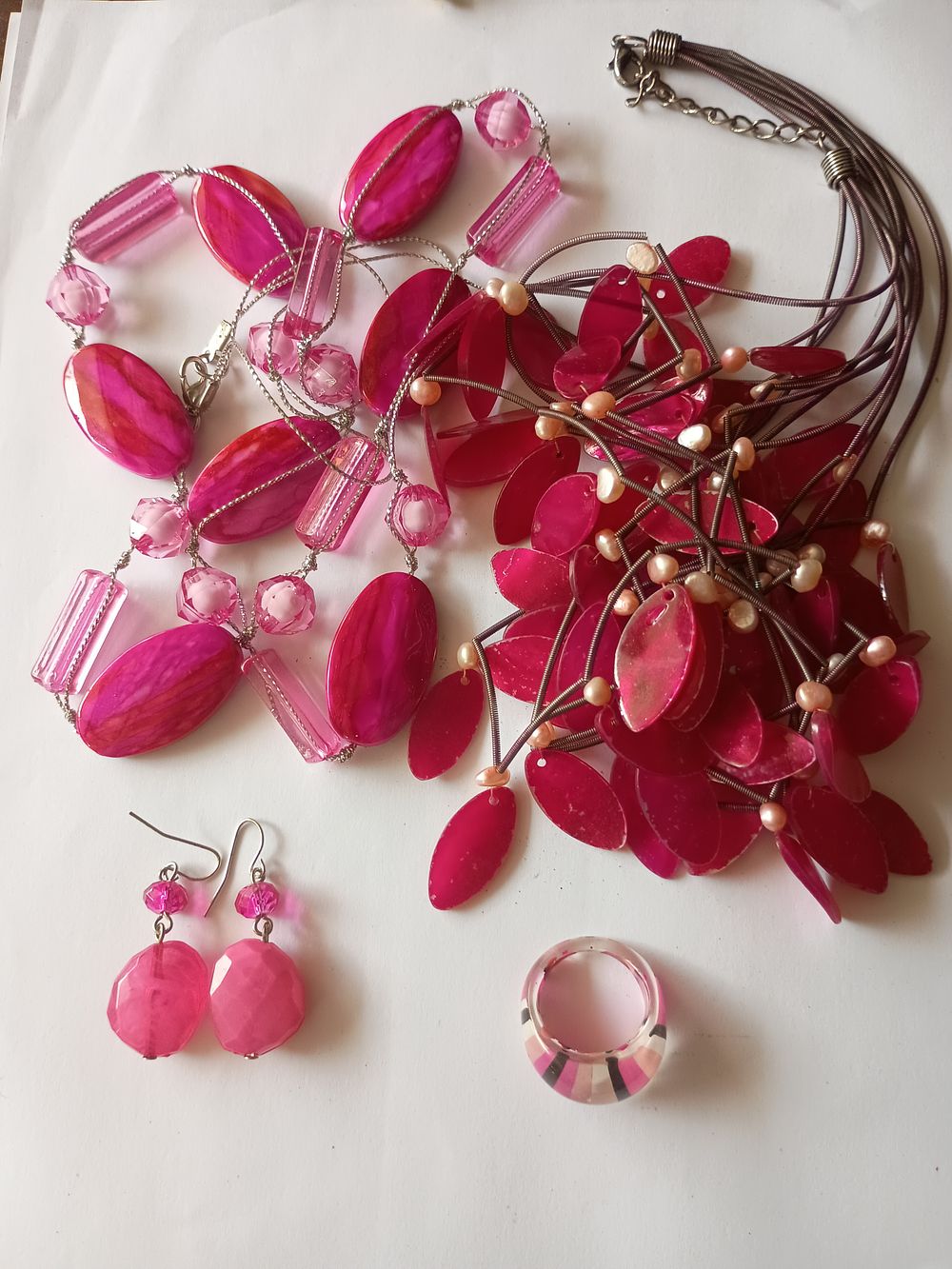Lot 226: Multi pink pendants Necklaces, earrings & Ring set