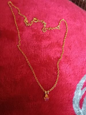 Gold tone fine necklace
