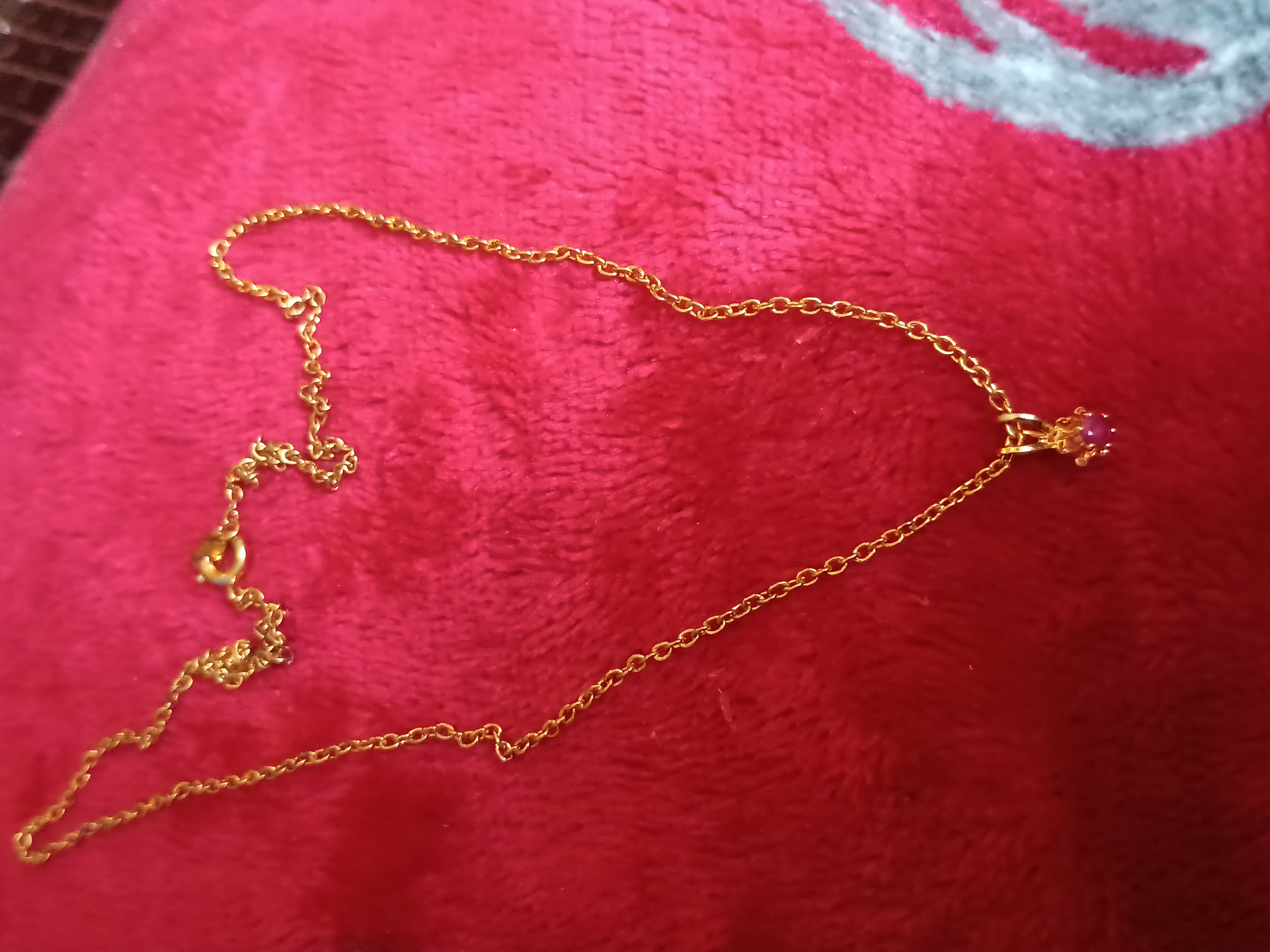 Gold tone fine necklace