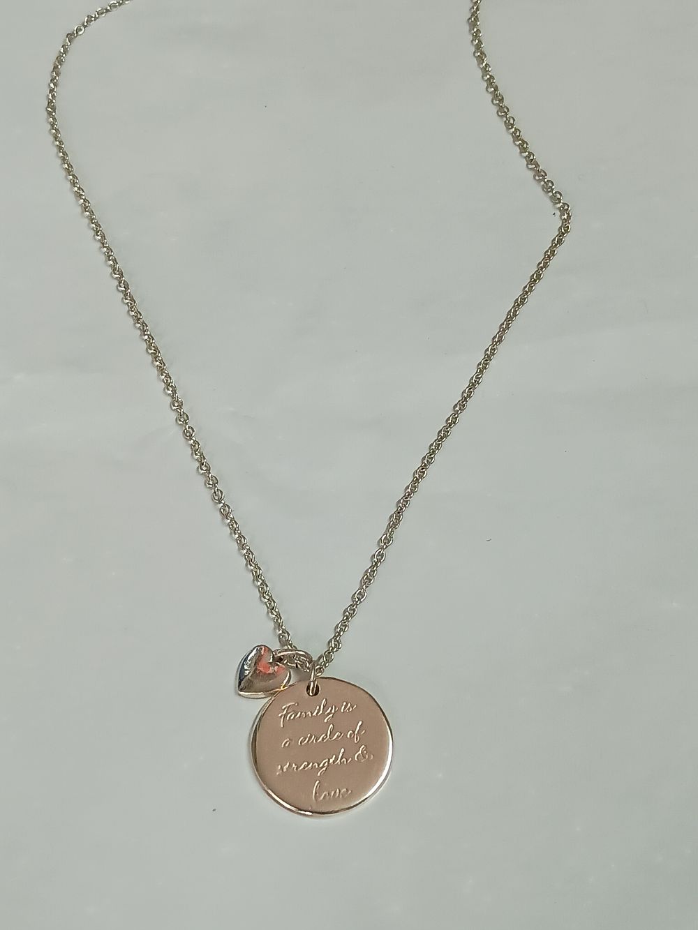 Lot 182: Family Pendant On chain