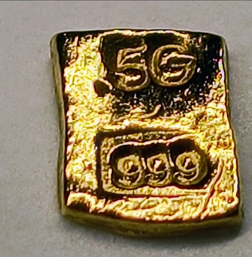 Lot 279: .5 g gold bar