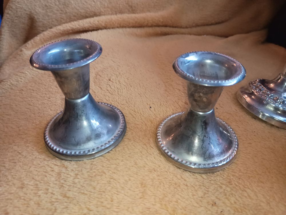 Lot 216: 2 silver plated candle holders