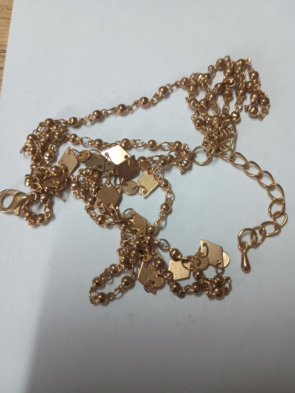Lot 18: Gold tone necklace