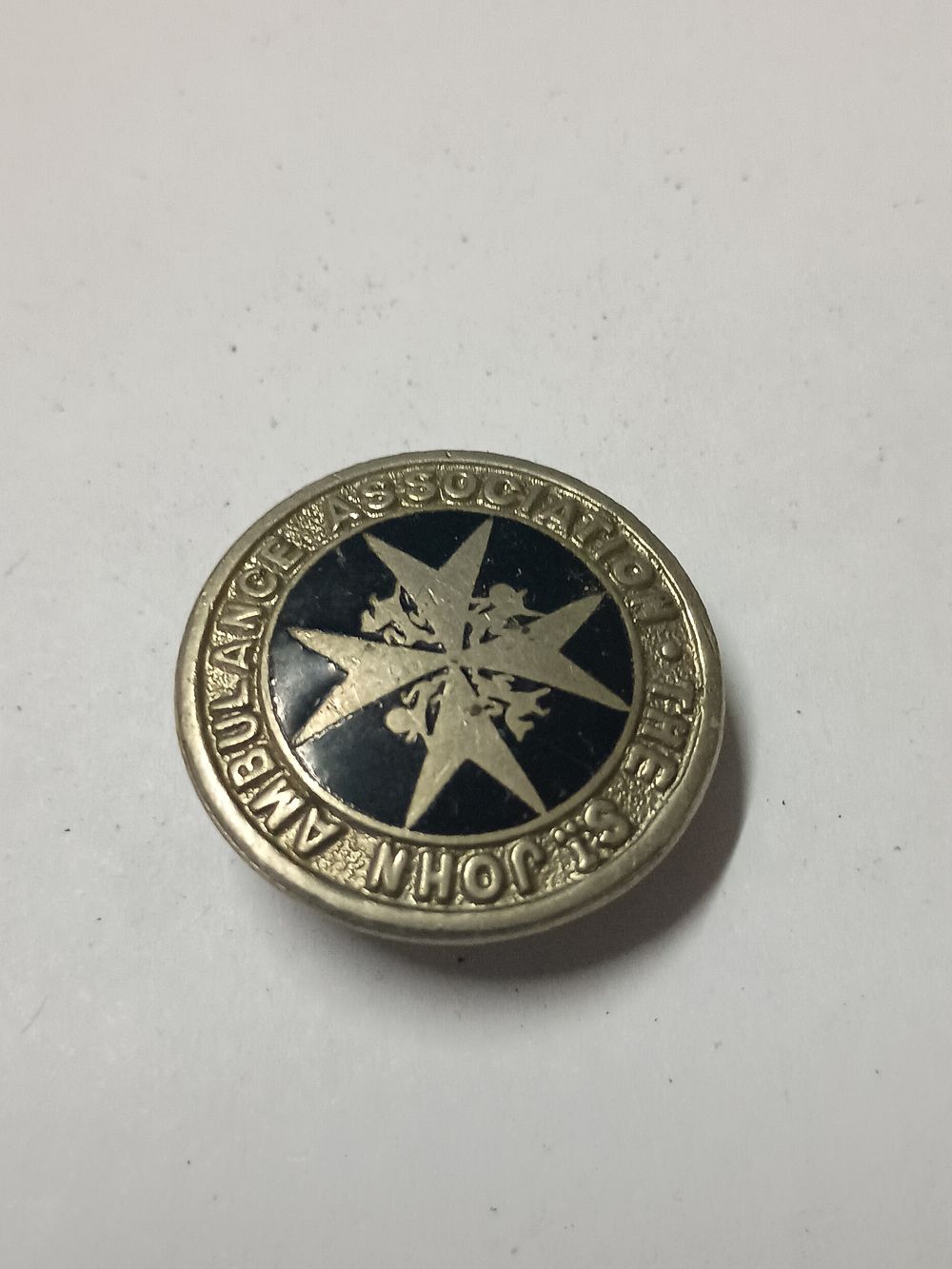 Lot 26: Vintage st Johns aumblance badge