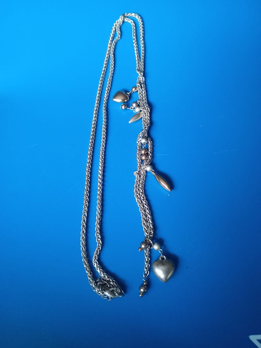 Lot 186: Vintage longer length Chain with pendants