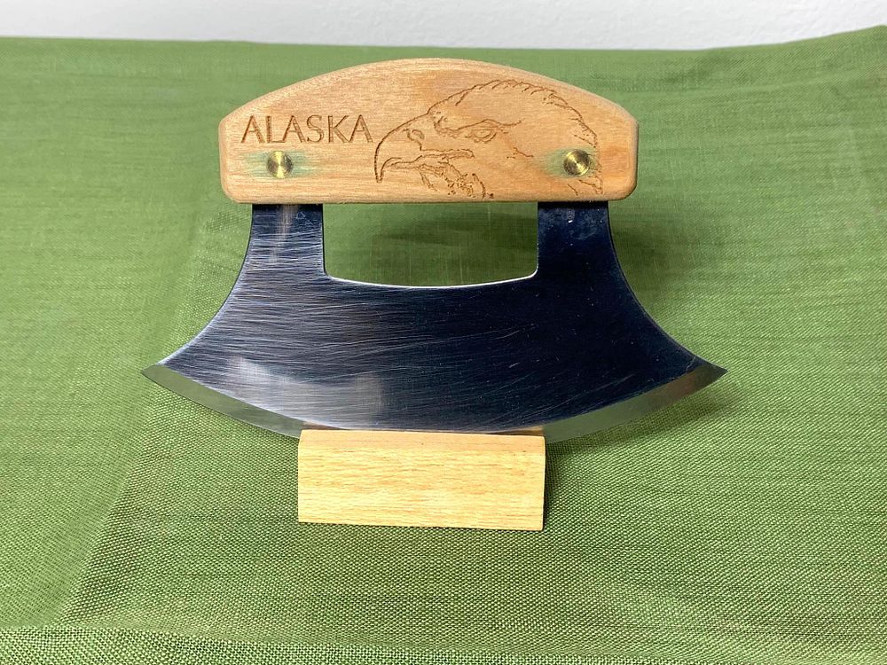 Alaskan Ulu Knife with Stand. In-house shipping available. Pickup is Tuesday, Marcy 25 from Noon 