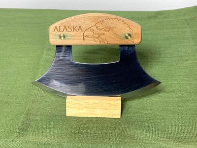 Alaskan Ulu Knife with Stand. In-house shipping available. Pickup is Tuesday, Marcy 25 from Noon 