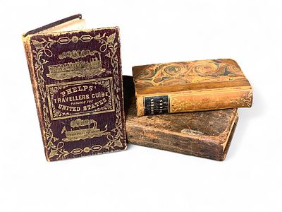 Antique Books - Phelps Travelers Guide, Leather-Bound Historical Texts. This lot features three 