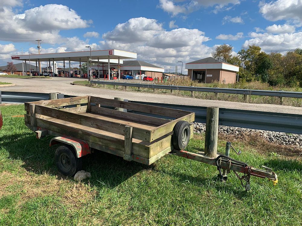 4 1/2' x 8' Utility Trailer Single Axle. With wood box. Payment and pickup by Nov. 7 at 5 pm.