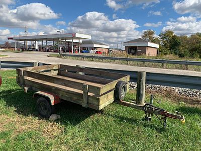 4 1/2' x 8' Utility Trailer Single Axle. With wood box. Payment and pickup by Nov. 7 at 5 pm.