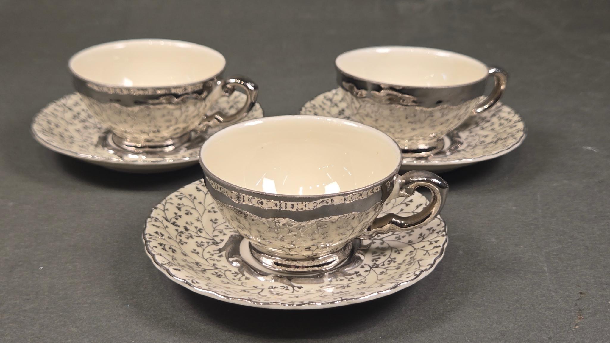 Lot 34046 - Bavaria Schirnding White Silver Floral Nine-Piece Tea