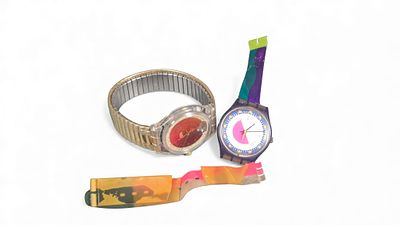 Two Swatch Watches: A 'Magic Tool' Automatic and a 'Depth' Model, with Detached Band Segment. A 
