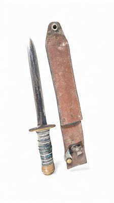 A WWII US Mark 2 Fighting Knife with Sheath. The dagger-style knife features a double-edged 