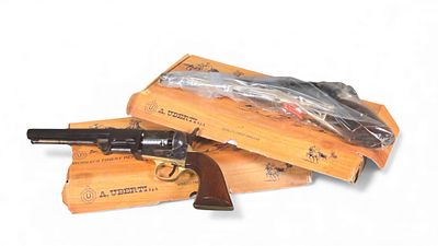 Two Uberti Black Powder Revolvers, Pistols in boxes Pick up is Tuesday, Dec. 16 from 2pm to 7 