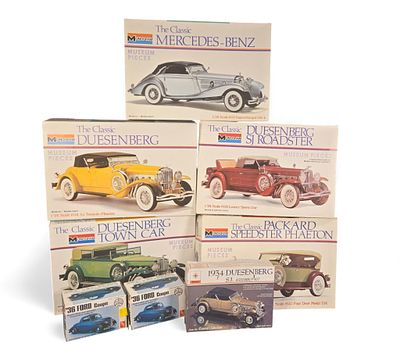 A Group of Eight Vintage Plastic Model Car Kits by Monogram, AMT, and Renwal. This lot comprises 