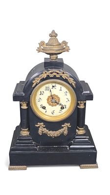 Ansonia Iron Mantel Clock, Neoclassical Style. An Ansonia Iron Mantel Clock in Neoclassical or 