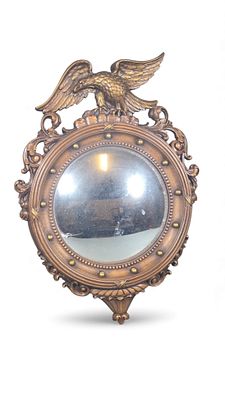 Federal Revival Carved Wood Eagle Wall Mirror. A circular convex wall mirror in the Federal or 