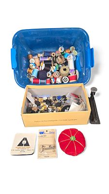 A Wilson Wil-Hold Sewing Box with a Collection of Sewing Notions and a Vintage Stapler. This lot 