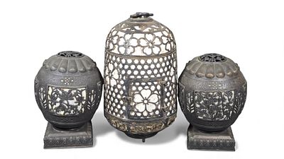 A Japanese Bronze Fire-fly Cage and a Pair of Lanterns. A group of three Japanese bronze objects 