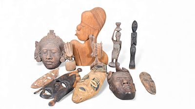 A Collection of African Tribal Wood Carvings and Masks. A collection of African tribal wood 