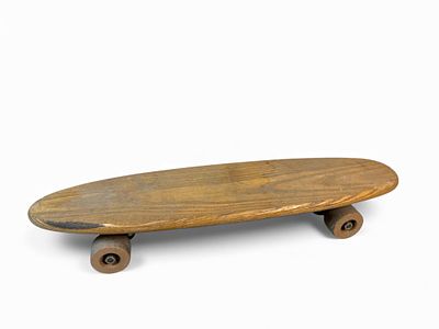 A Vintage 1960s Super Surfer Skateboard with Clay Wheels. A vintage 1960s Super Surfer 