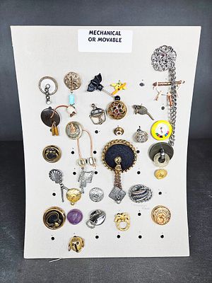 An Assortment of Unique Vintage Mechanical and Movable Buttons. A collection of vintage buttons 