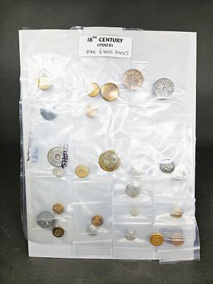 An Assortment of 18th Century Military and Decorative Brass Buttons. This collection features an 