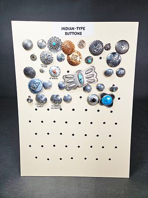 A Collection of Native American Style Silver and Copper Tone Buttons with Turquoise and Coral Inlays