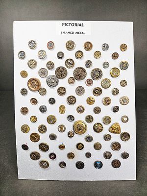 A Collection of Antique and Vintage Pictorial Metal Buttons. A collection of antique and vintage 