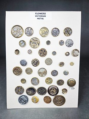 A Collection of Victorian Metal Floral Buttons. A collection of Victorian metal buttons 