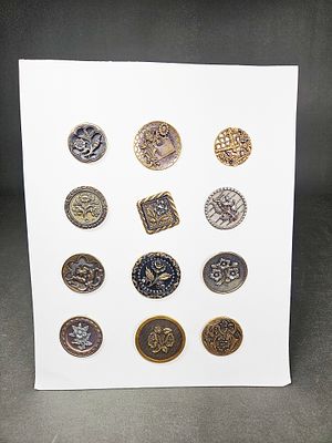 A Collection of Victorian Metal Floral Buttons. This collection of buttons features various 