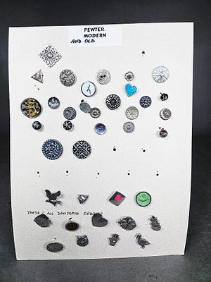 An Assortment of Modern and Antique Pewter Buttons including Danforth Pewter. An assortment of 