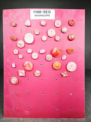 An Assortment of Vintage Pink and Red Moonglow Lucite Buttons. An assortment of vintage buttons 