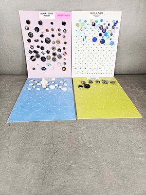 An Assortment of Modern and Vintage Glass Buttons. An assortment of modern and vintage glass 