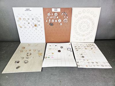 A Collection of Vintage and Modern Clear Glass Buttons. A collection of buttons primarily 