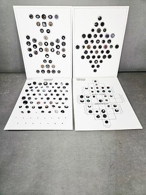 A Collection of Antique Black Glass Buttons, 19th Century. A collection of antique black glass 