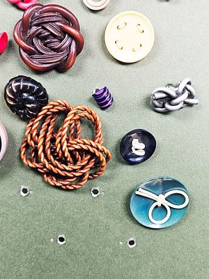 A Collection of Vintage Extruded and Carved Celluloid Buttons. A collection of vintage buttons 