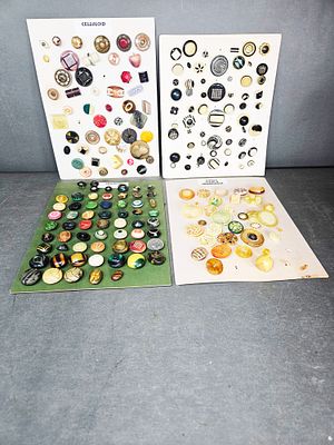 A Collection of Vintage Celluloid, Bakelite, and Vegetable Ivory Buttons. A collection of 