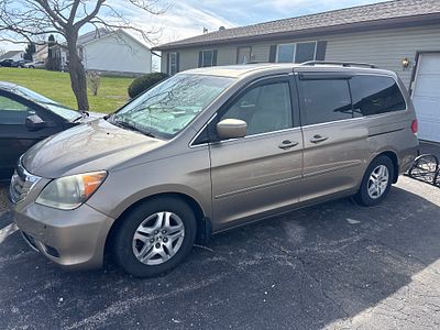2010 Honda Odyssey EX Minivan VIN 5FNRL3H74AB096333. See the video. A bronze 2010 Honda Odyssey 