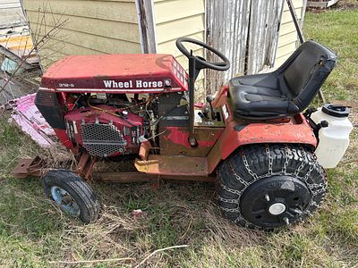 Wheel Horse 312-8 Garden Tractor. This Wheel Horse 312-8 is a 2WD open station garden tractor. 