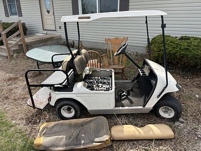 E-Z-GO TXT Arnold Palmer Signature Edition Electric Four-Passenger Golf Cart. Seat needs to be 