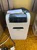 GE 6000 BTU Window Air Conditioner and Idylis Portable Air Conditioner. A GE 6,000 BTU window Image - 4
