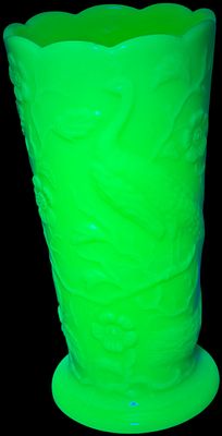Fenton Custard Uranium Glass Peacock Footed Vase. A Fenton custard uranium glass footed vase 