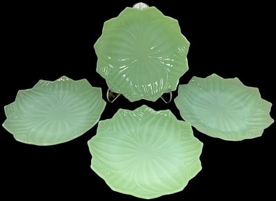 A Set of Four Jadeite Glass Plates Attributed to Fire-King in the Lotus Pattern. This set of 